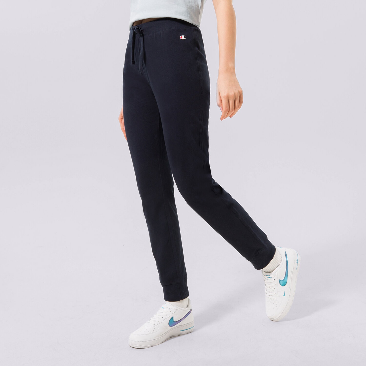 Spodnie sportowe damskie CHAMPION SPODNIE RIB CUFF PANTS 114907BS501 GRANATOWY