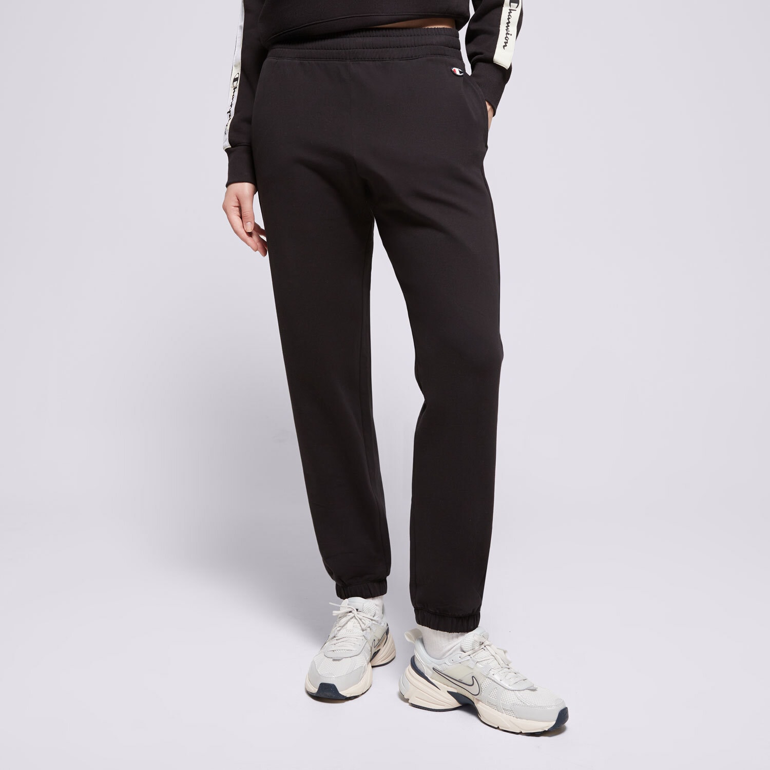 Spodnie sportowe damskie CHAMPION SPODNIE ELASTIC CUFF PANTS 116610KK001 CZARNY