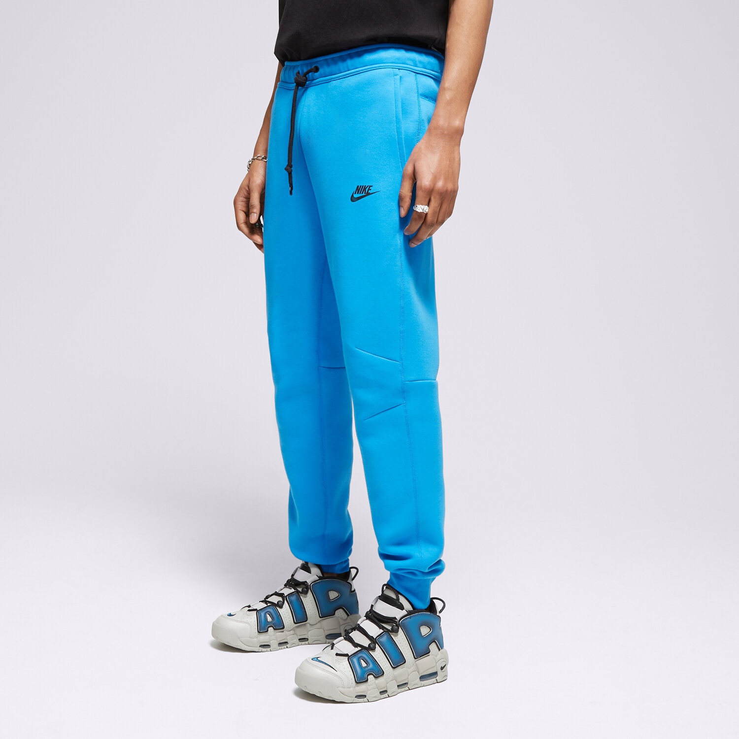 Spodnie sportowe męskie NIKE SPODNIE M NK TCH FLC JGGR TECH FB8002-435 NIEBIESKI