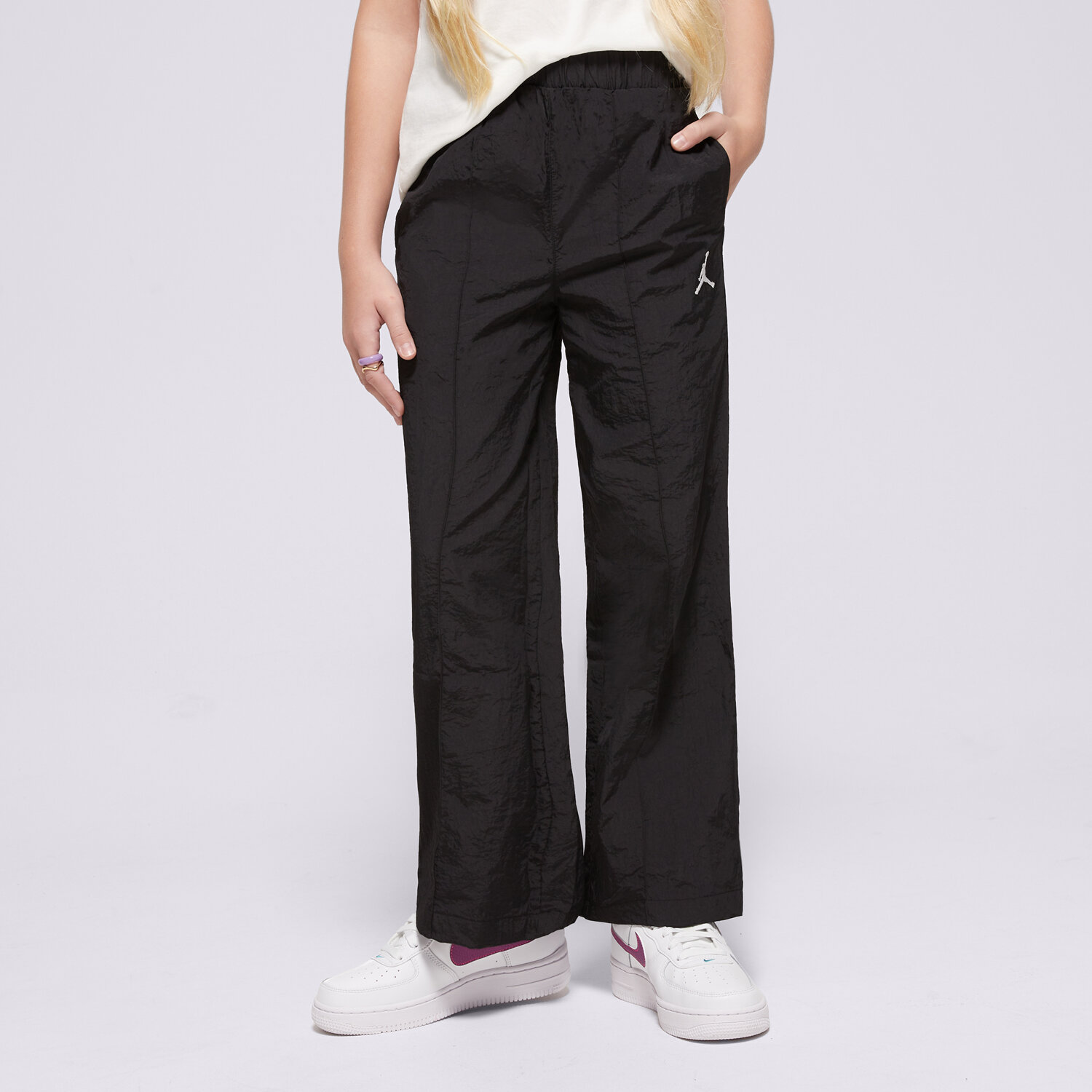 Sportowe spodnie dziecięce JORDAN SPODNIE JDG JUMPMAN WOVEN TAPING PANT GIRL 45D346-023 CZARNY