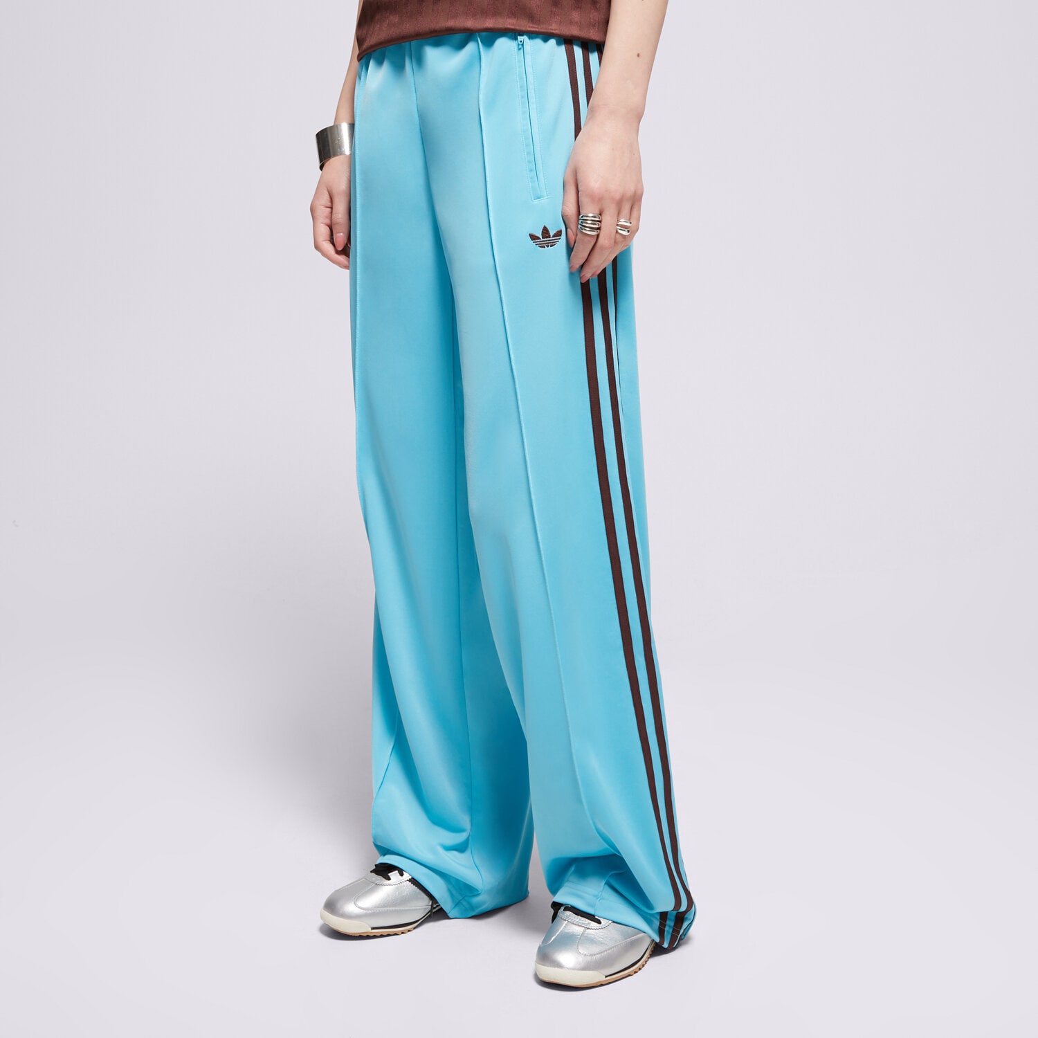 Spodnie sportowe damskie ADIDAS SPODNIE FIREBIRD TP JY2689 NIEBIESKI
