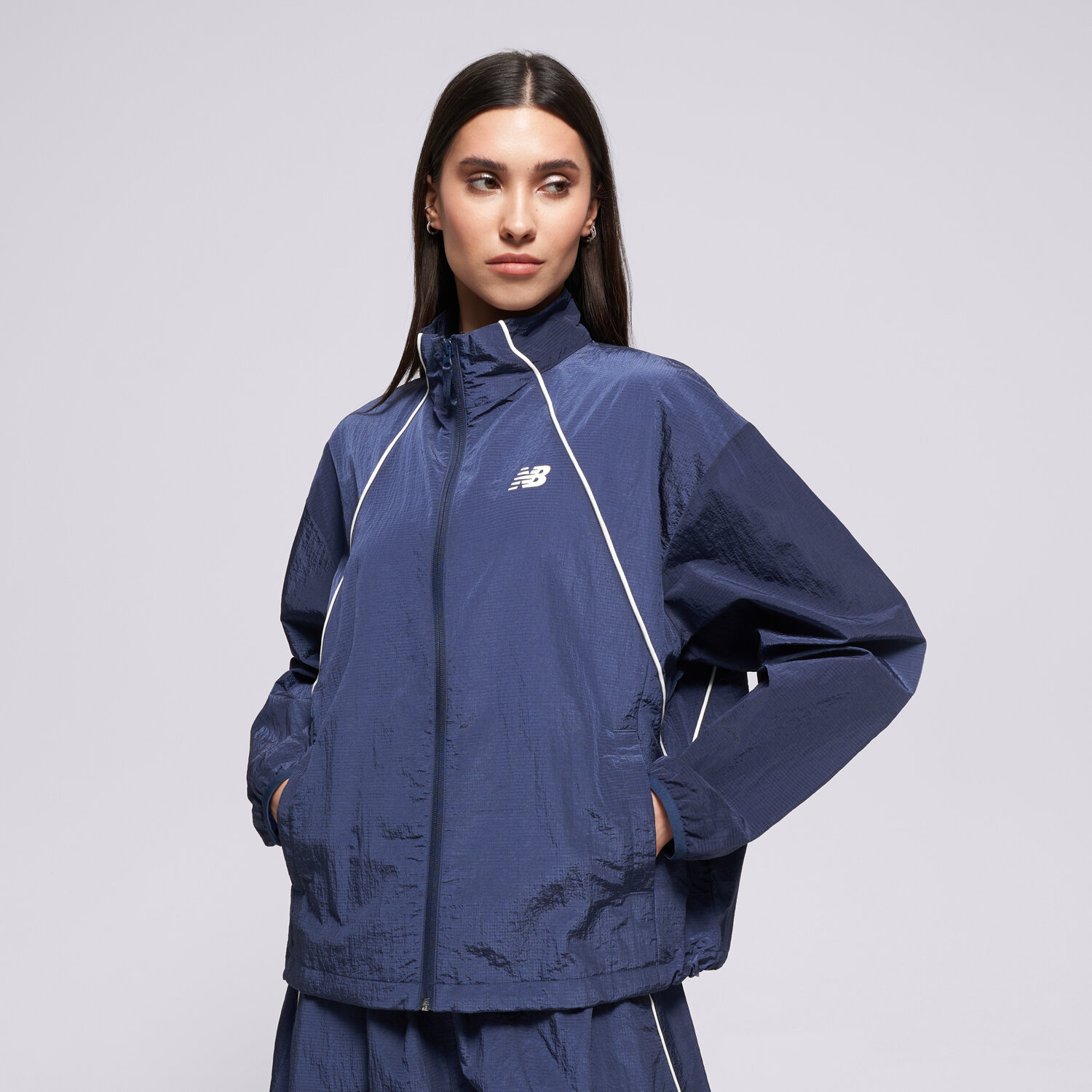 Kurtka wiosenna / jesienna damska NEW BALANCE KURTKA SPORT LEGACY JACKET WJ6113KSNNY GRANATOWY