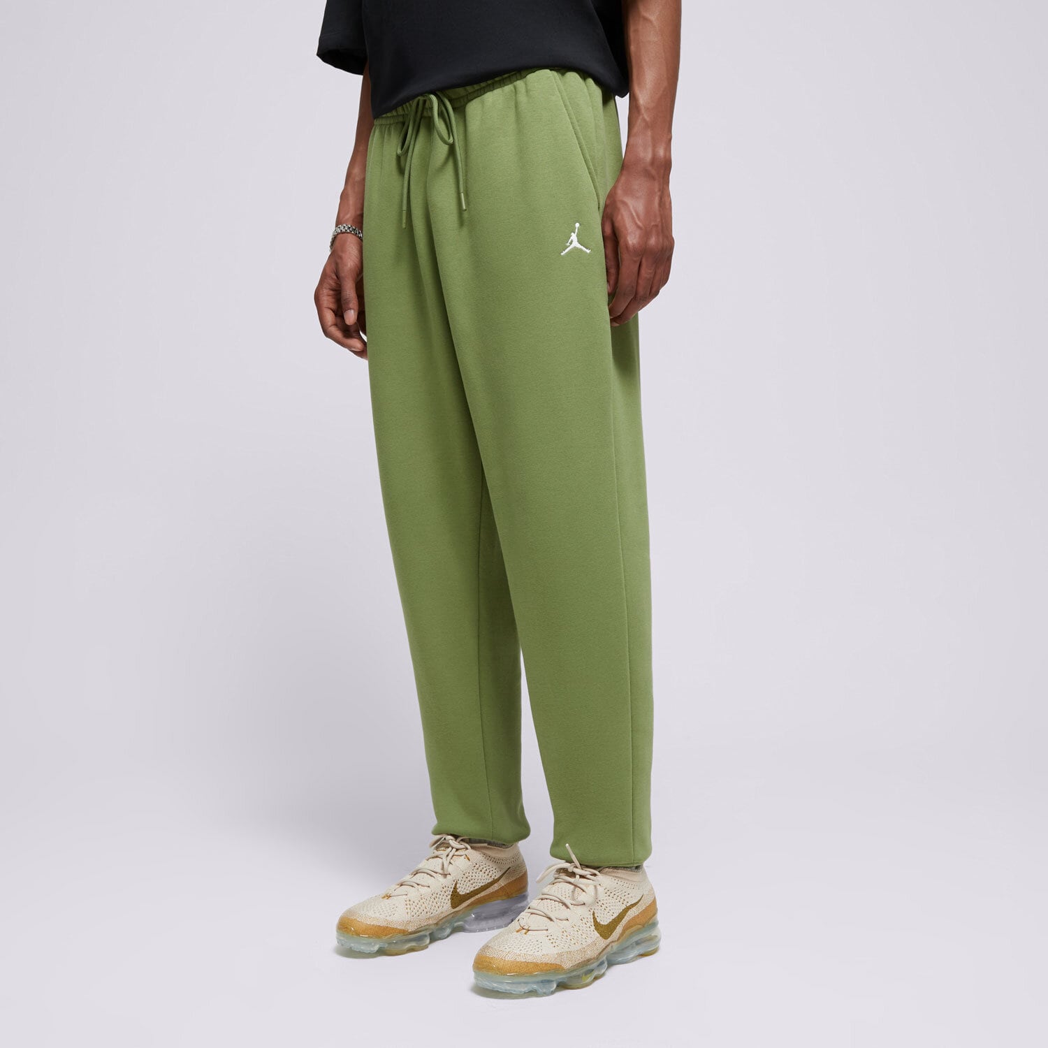 Spodnie sportowe męskie JORDAN SPODNIE M J ESS FLC FJ7779-340 KHAKI