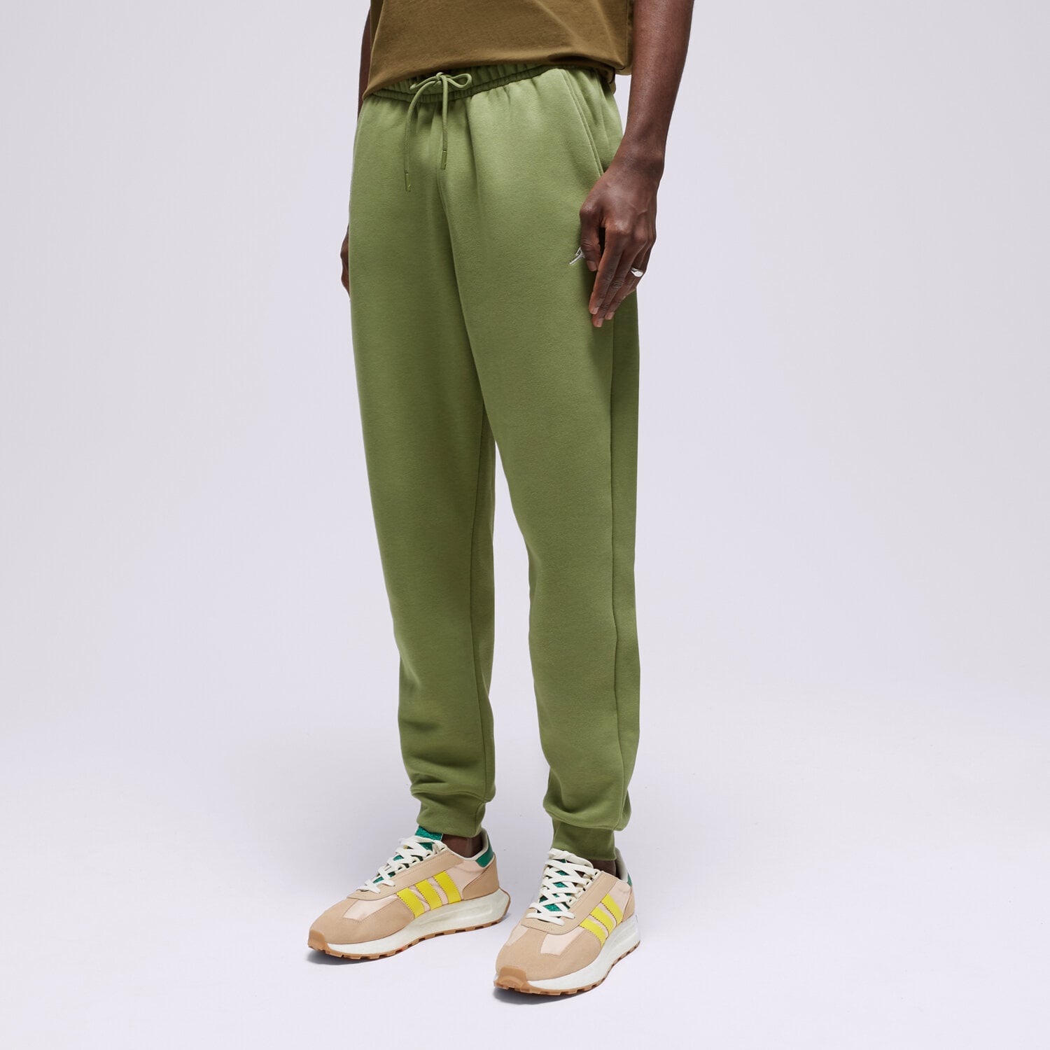 Spodnie sportowe męskie JORDAN SPODNIE M J ESS FLC FJ7779-340 KHAKI