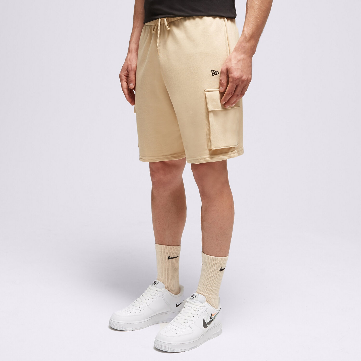 Krótkie spodenki, szorty męskie NEW ERA SZORTY NE ESSENTIALS CARGO STN NONE 60332273 BEŻOWY