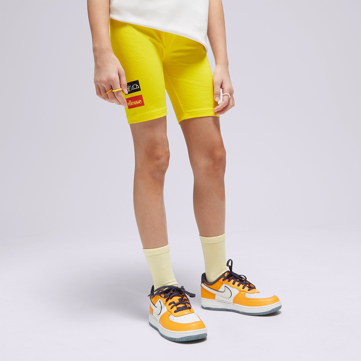 ELLESSE SZORTY YELLOWISH JNR SHORT YELLOW S4ML15228606 ŻÓŁTY