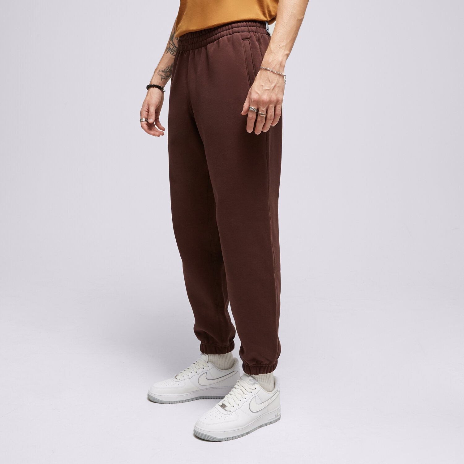 Spodnie sportowe męskie ADIDAS SPODNIE P ESS PANTS IM2130 BRĄZOWY