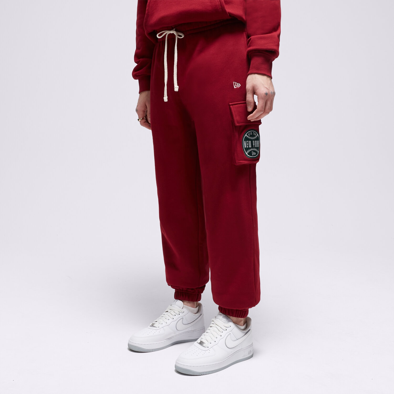 Spodnie sportowe męskie NEW ERA SPODNIE NE CARGO NONE 60416406 BORDOWY
