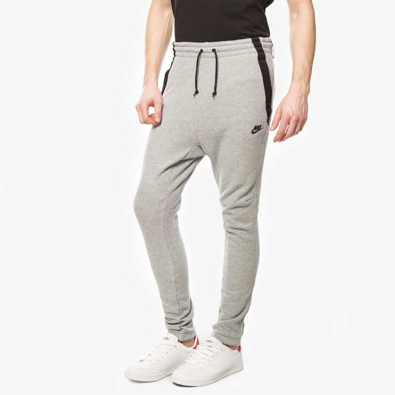 Spodnie sportowe męskie NIKE SPODNIE MODERN FT CUFF PANT 807920063 SZARY