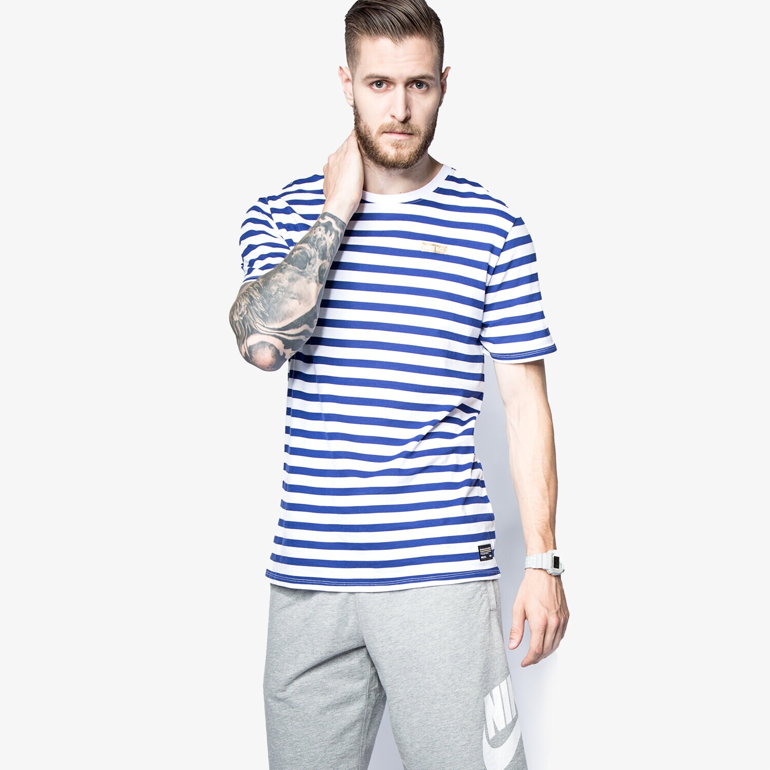 Koszulka, t-shirt sportowy męski NIKE T-SHIRT FC STRIPE TEE 789449100 NIEBIESKI