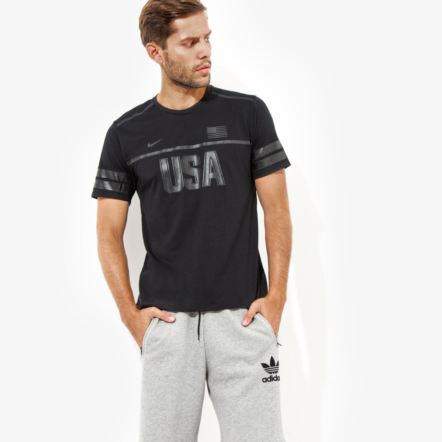 Koszulka, t-shirt sportowy męski NIKE T-SHIRT M NK DRY TOP SS ENERGY USA 812031010 CZARNY