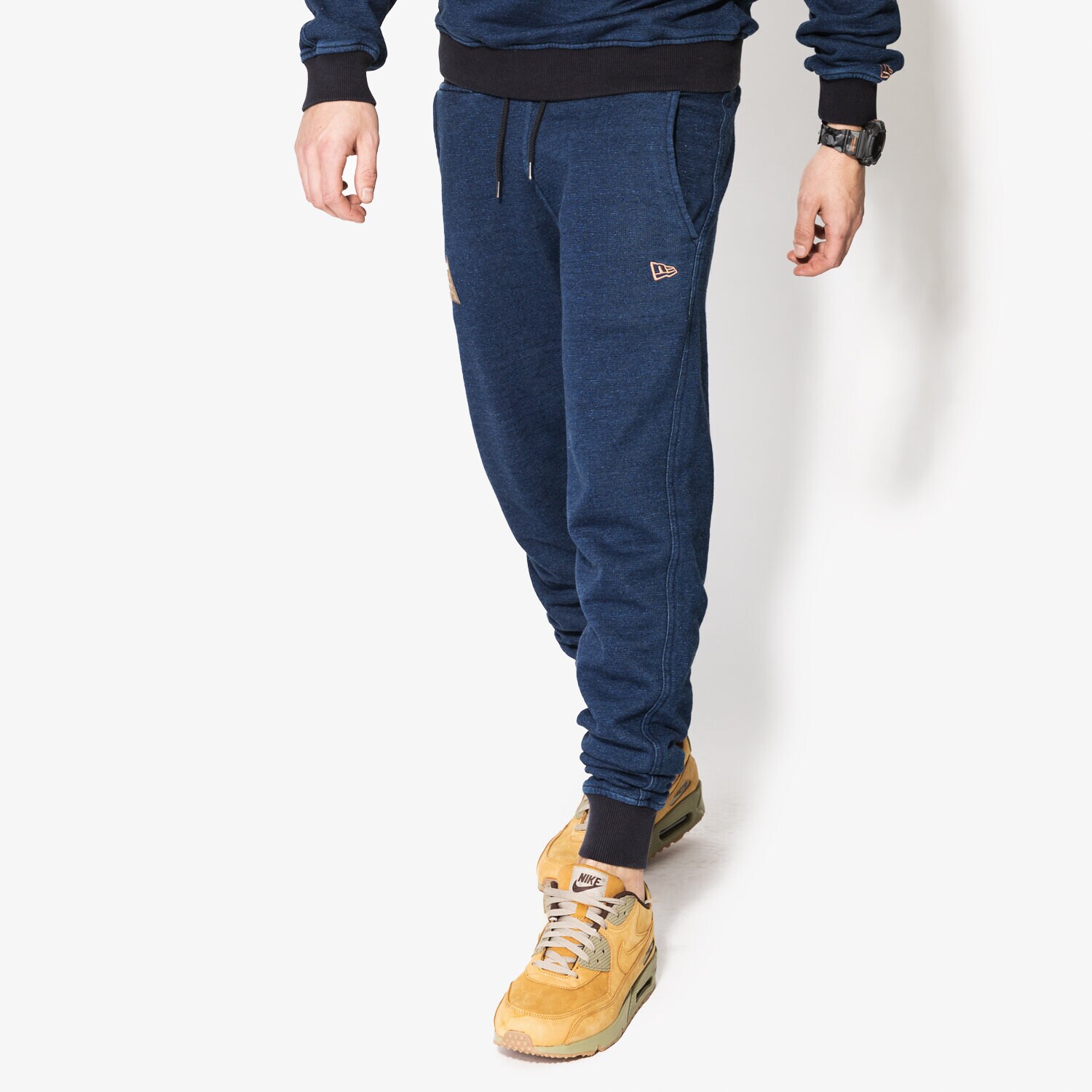 Spodnie sportowe męskie NEW ERA SPODNIE CRAFTED TRACK PANT NE 11351563 GRANATOWY