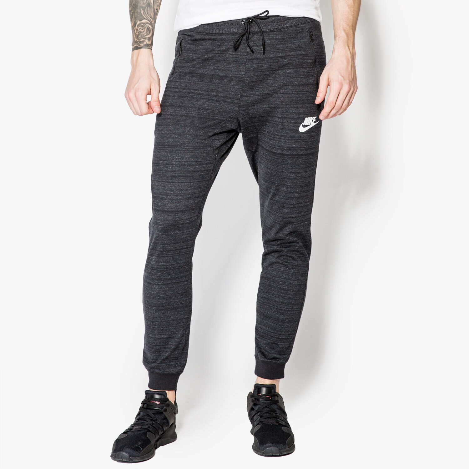Spodnie sportowe męskie NIKE SPODNIE NSW AV15 JOGGER KNIT 837012010 CZARNY