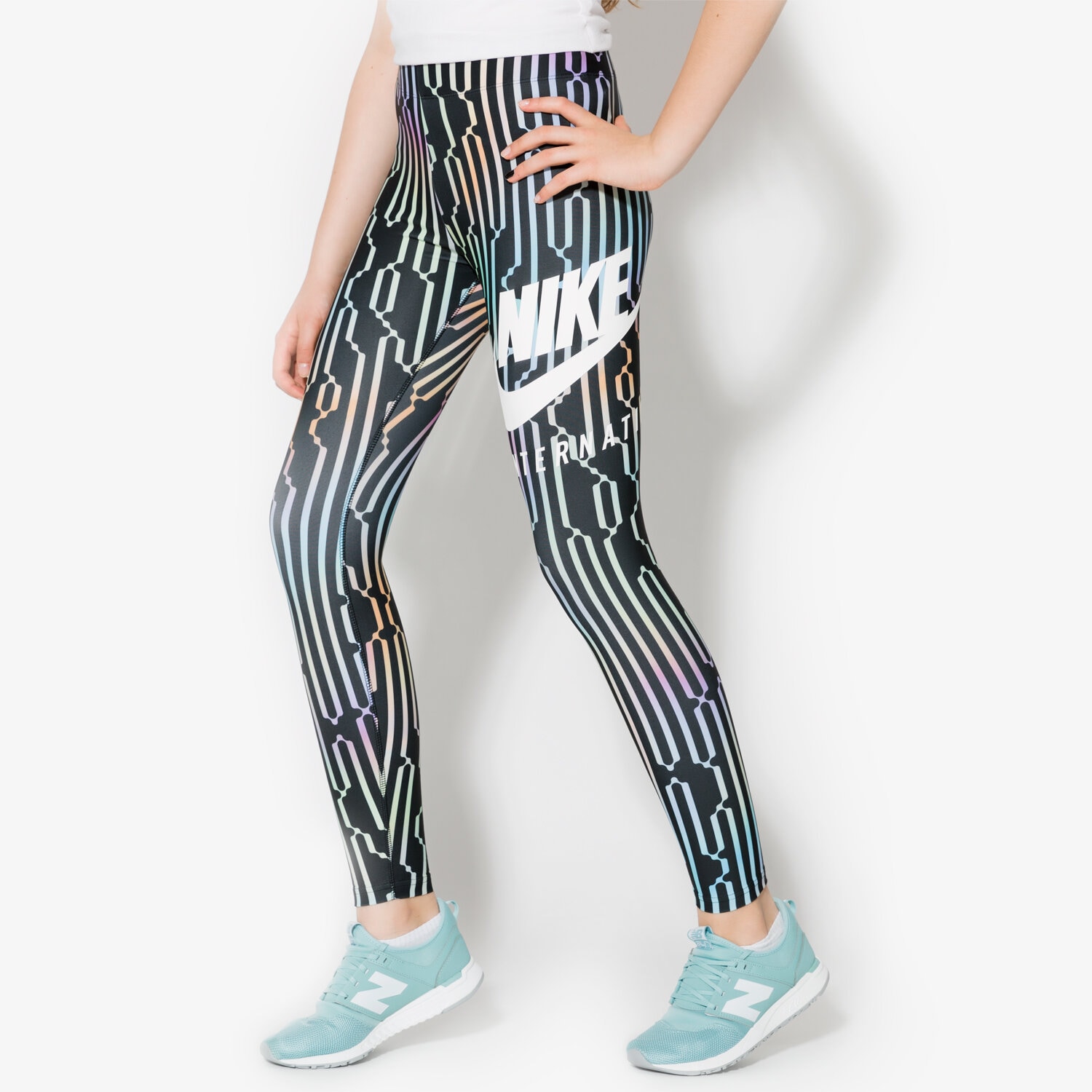 Spodnie sportowe damskie NIKE LEGGINGS W NK INTL LGGNG AOP 881176010 MULTICOLOR