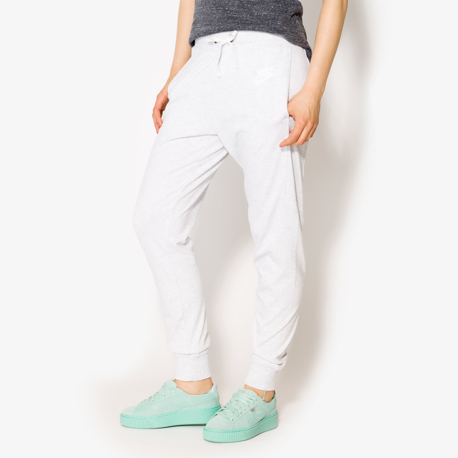 Spodnie sportowe damskie NIKE SPODNIE W NSW GYM CLC PANT 854957051 SZARY