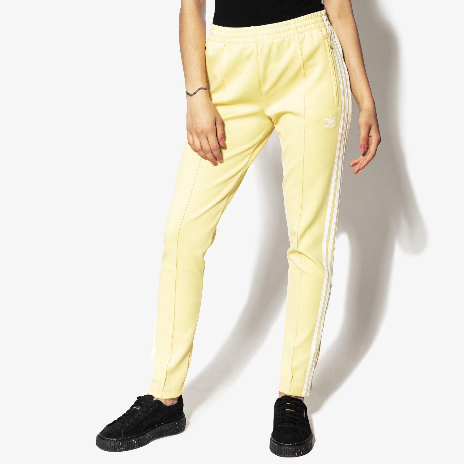 Spodnie sportowe damskie ADIDAS SPODNIE SST TP CE2405 ŻÓŁTY