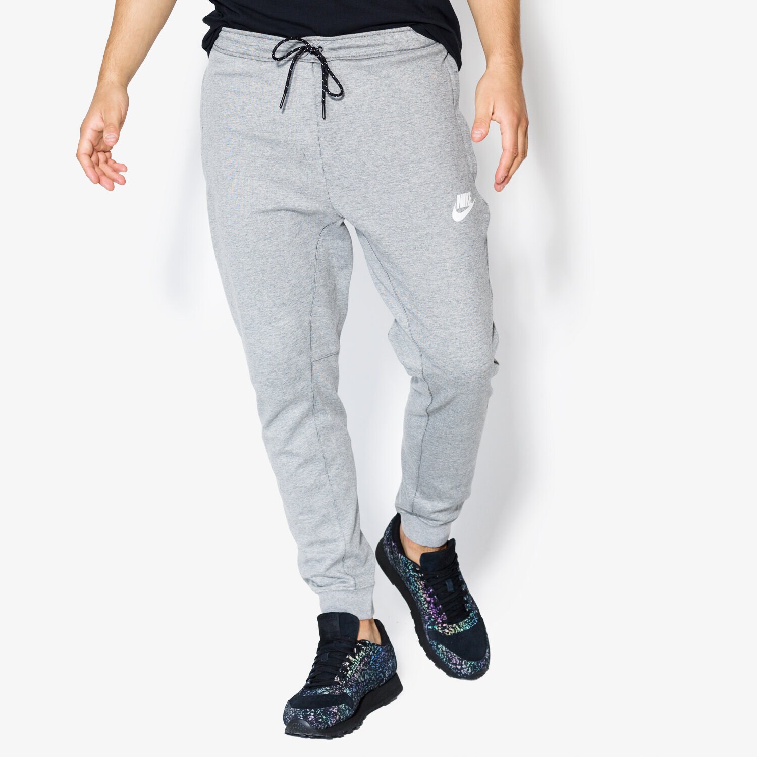 Spodnie sportowe męskie NIKE SPODNIE AV15 JGGR FLC 861746063 SZARY