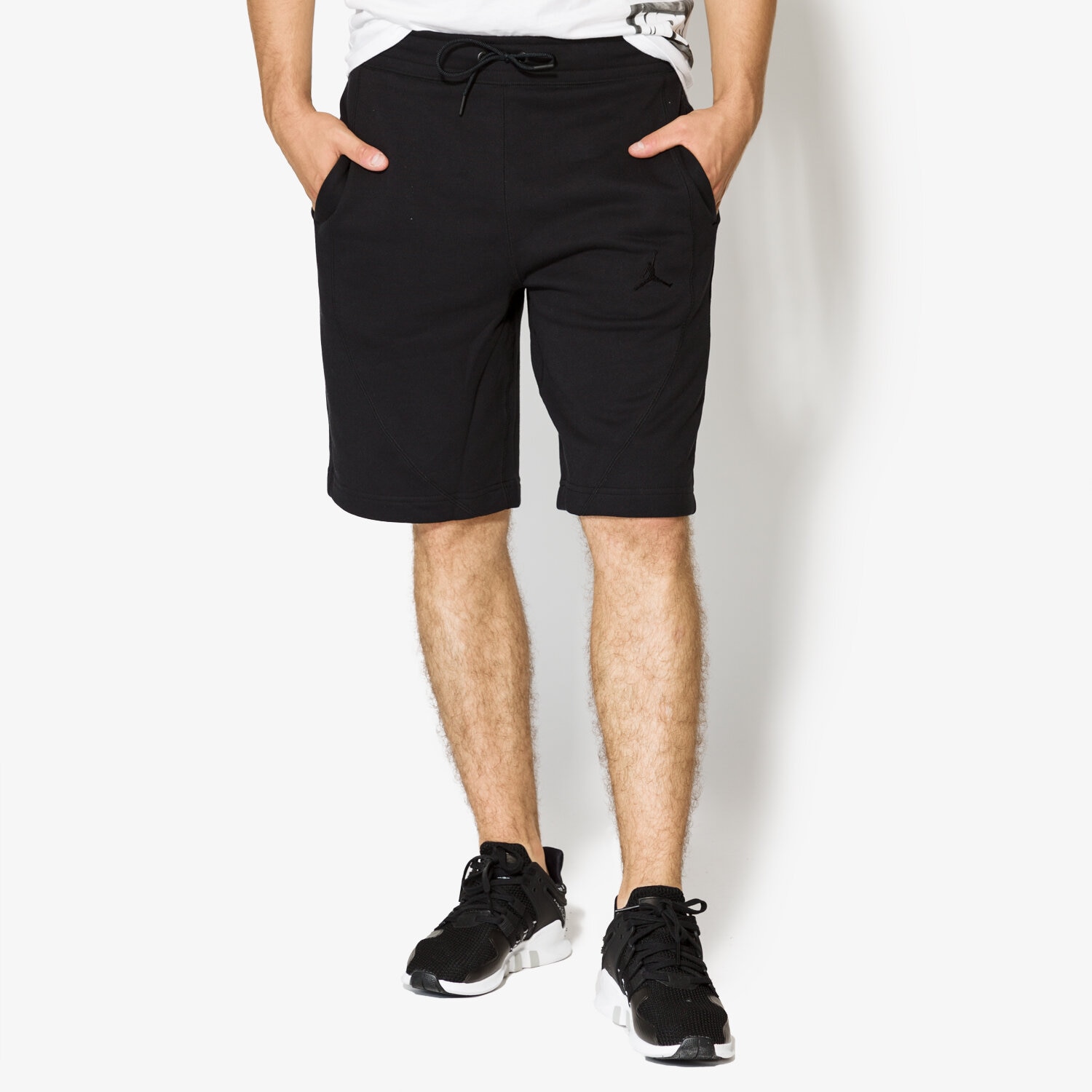 Krótkie spodenki, szorty męskie JORDAN SZORTY JSW WINGS FLEECE SHORT 884278013 CZARNY