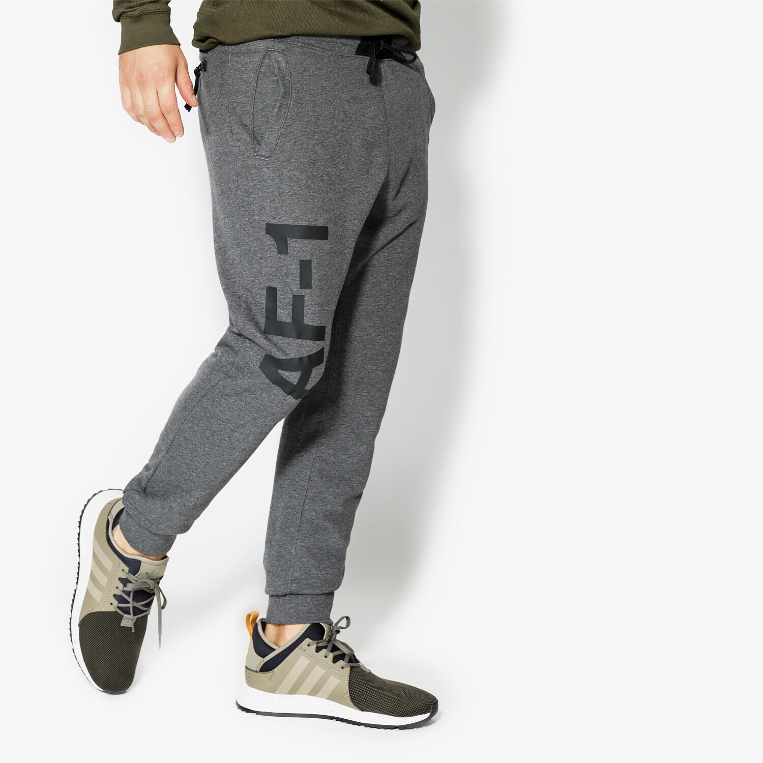 Spodnie sportowe męskie NIKE SPODNIE M NSW JGGR FT AF1 925444071 SZARY