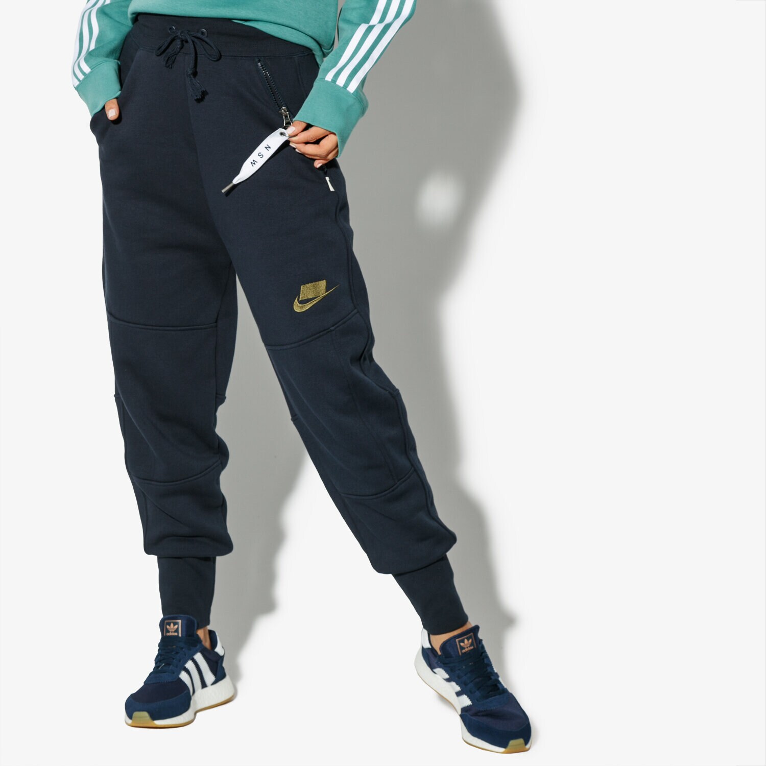 Spodnie sportowe damskie NIKE SPODNIE W NSW PANT FLC JOGGER NSW AH4005-475 GRANATOWY
