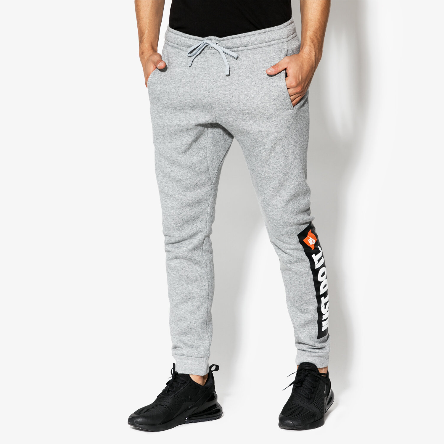 Spodnie sportowe męskie NIKE SPODNIE M NSW JGGR FLC HBR 928725-063 SZARY