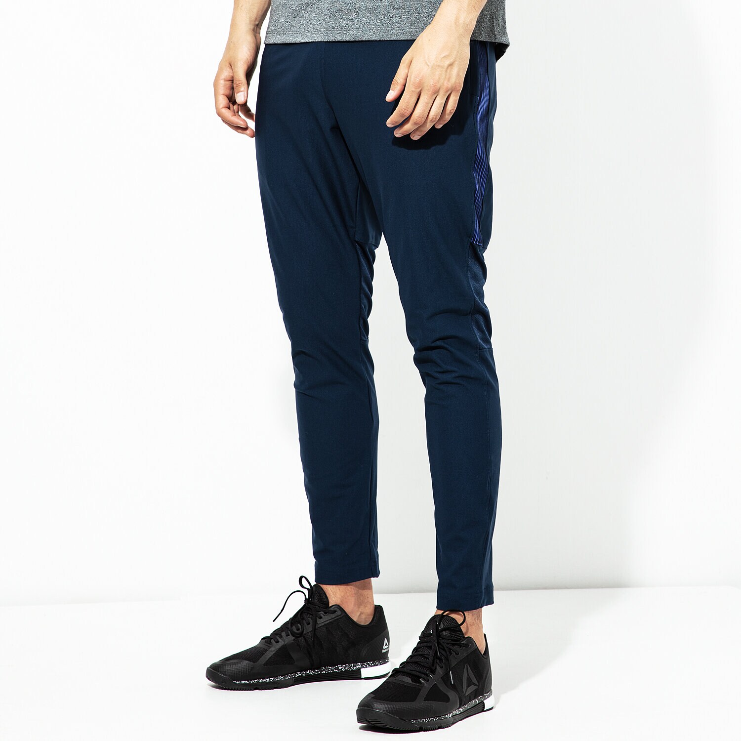 Spodnie sportowe męskie UNDER ARMOUR SPODNIE THREADBORNE VANISH PANT 1309828-408 GRANATOWY