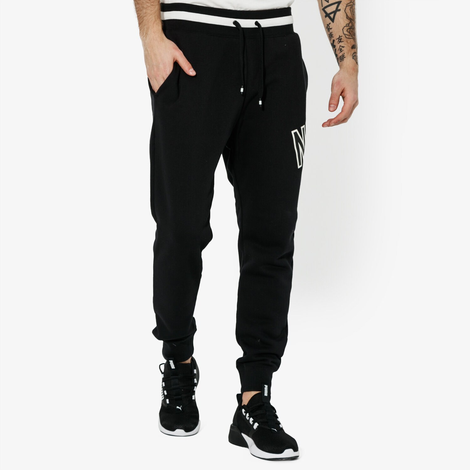 Spodnie sportowe męskie NIKE SPODNIE M NSW NIKE AIR PANT FLC SPORTSWEAR AR1824-010 CZARNY