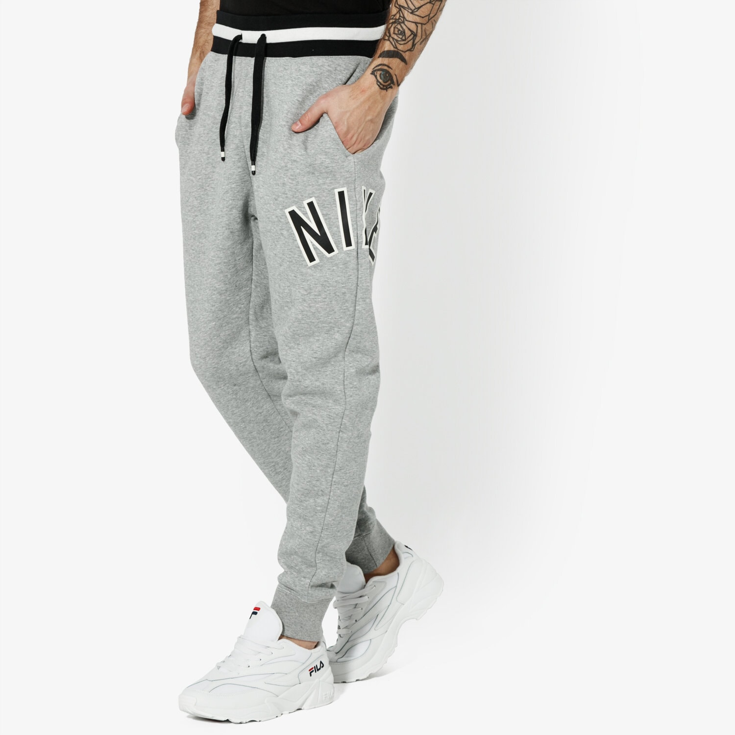 Spodnie sportowe męskie NIKE SPODNIE M NSW NIKE AIR PANT FLC SPORTSWEAR AR1824-063 SZARY