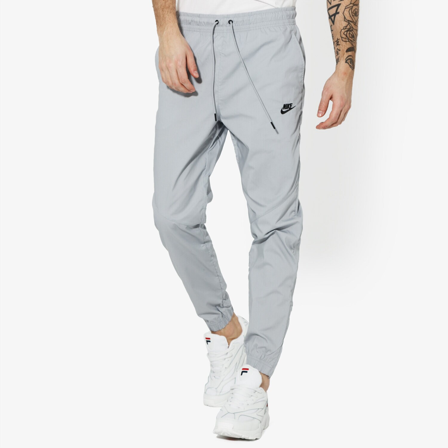Spodnie sportowe męskie NIKE SPODNIE M NSW PANT WR STREET SPORTSWEAR AR2368-012 SZARY