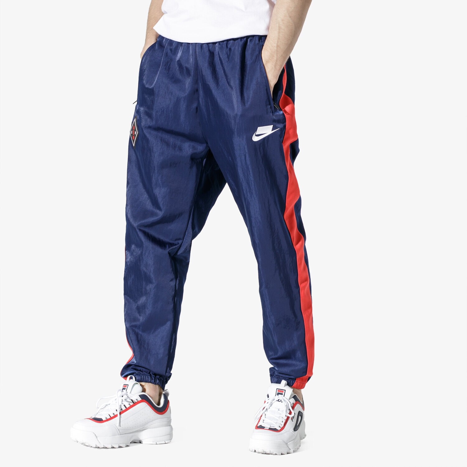 Spodnie sportowe męskie NIKE SPODNIE M NSW NSP PANT WVN AR1628-492 GRANATOWY