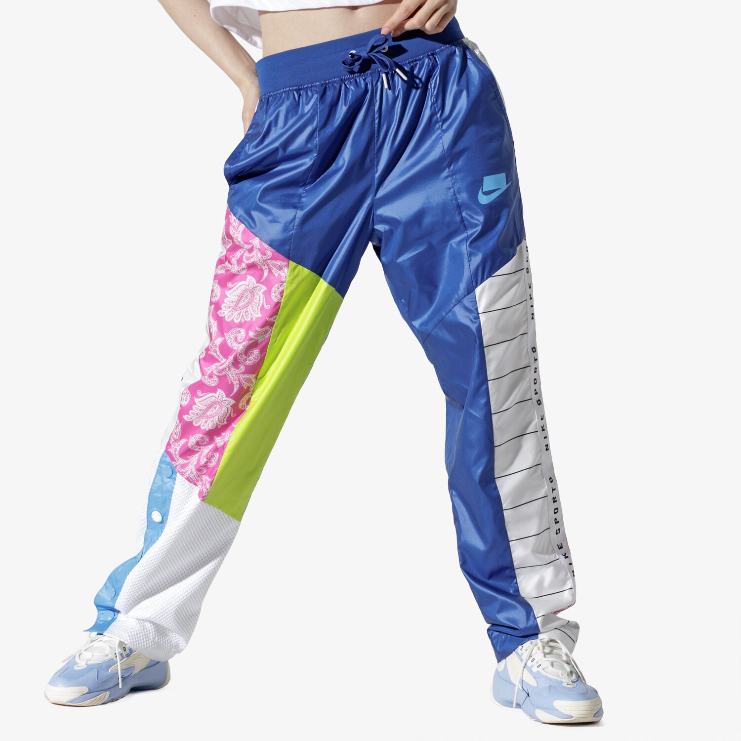 Spodnie sportowe damskie NIKE W NSW NSP TRK PANT WVN AR2940-438 MULTICOLOR