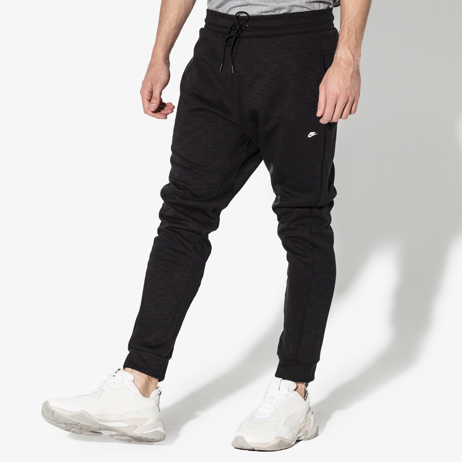 Spodnie sportowe męskie NIKE SPODNIE M NSW OPTIC JGGR 928493-011 CZARNY