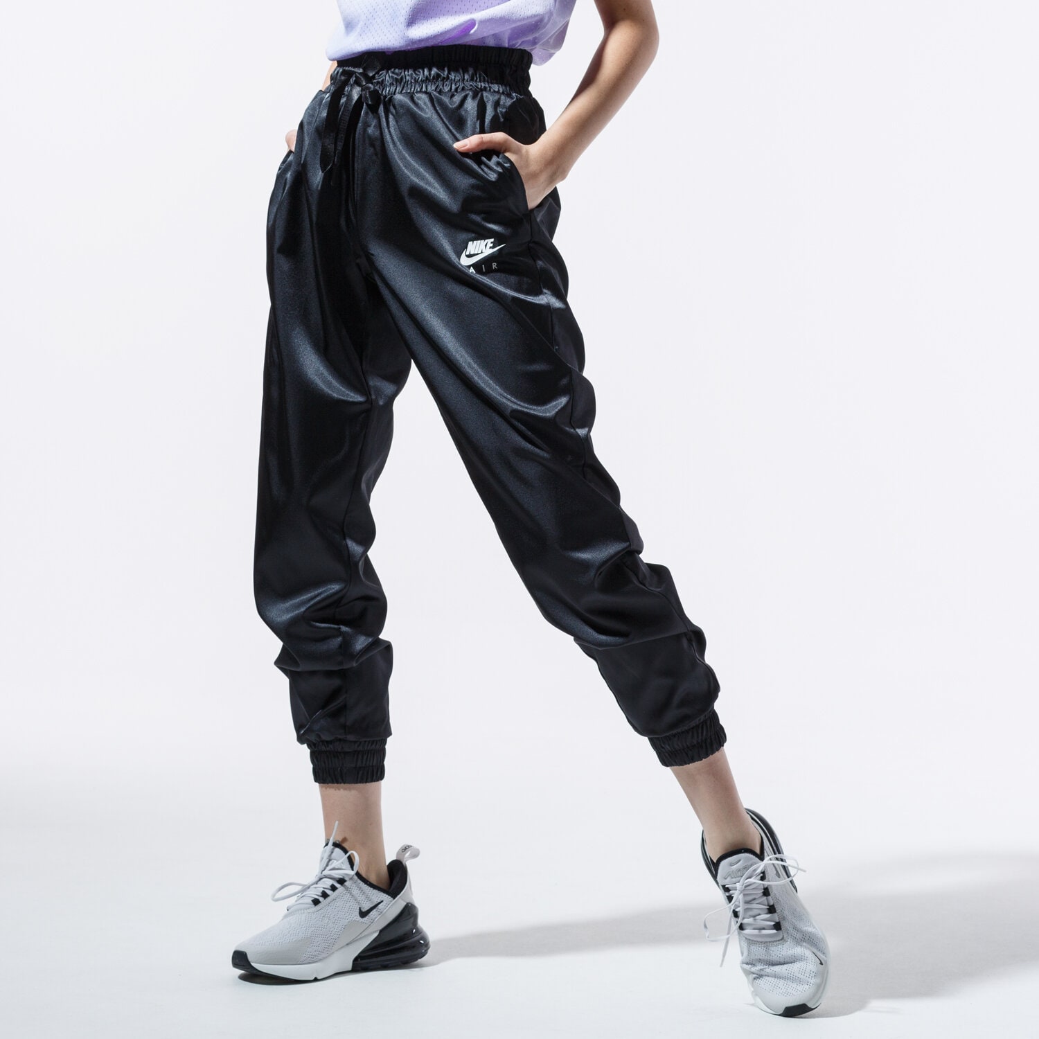 Spodnie sportowe damskie NIKE SPODNIE W NSW AIR TRK PANT SATIN BV4781-010 CZARNY