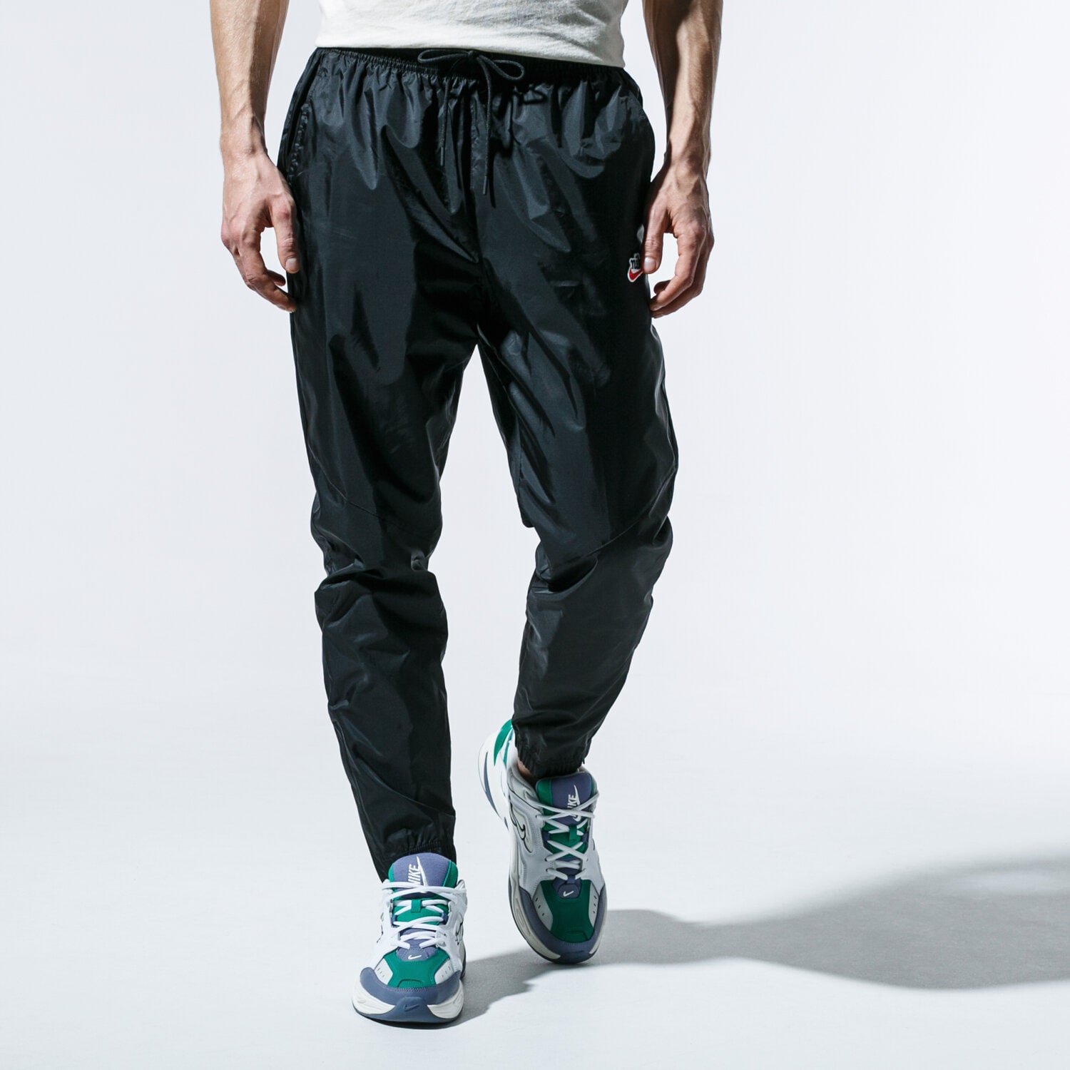 Spodnie sportowe męskie NIKE SPODNIE M NSW HE PANT WR PATCH CQ8916-010 CZARNY