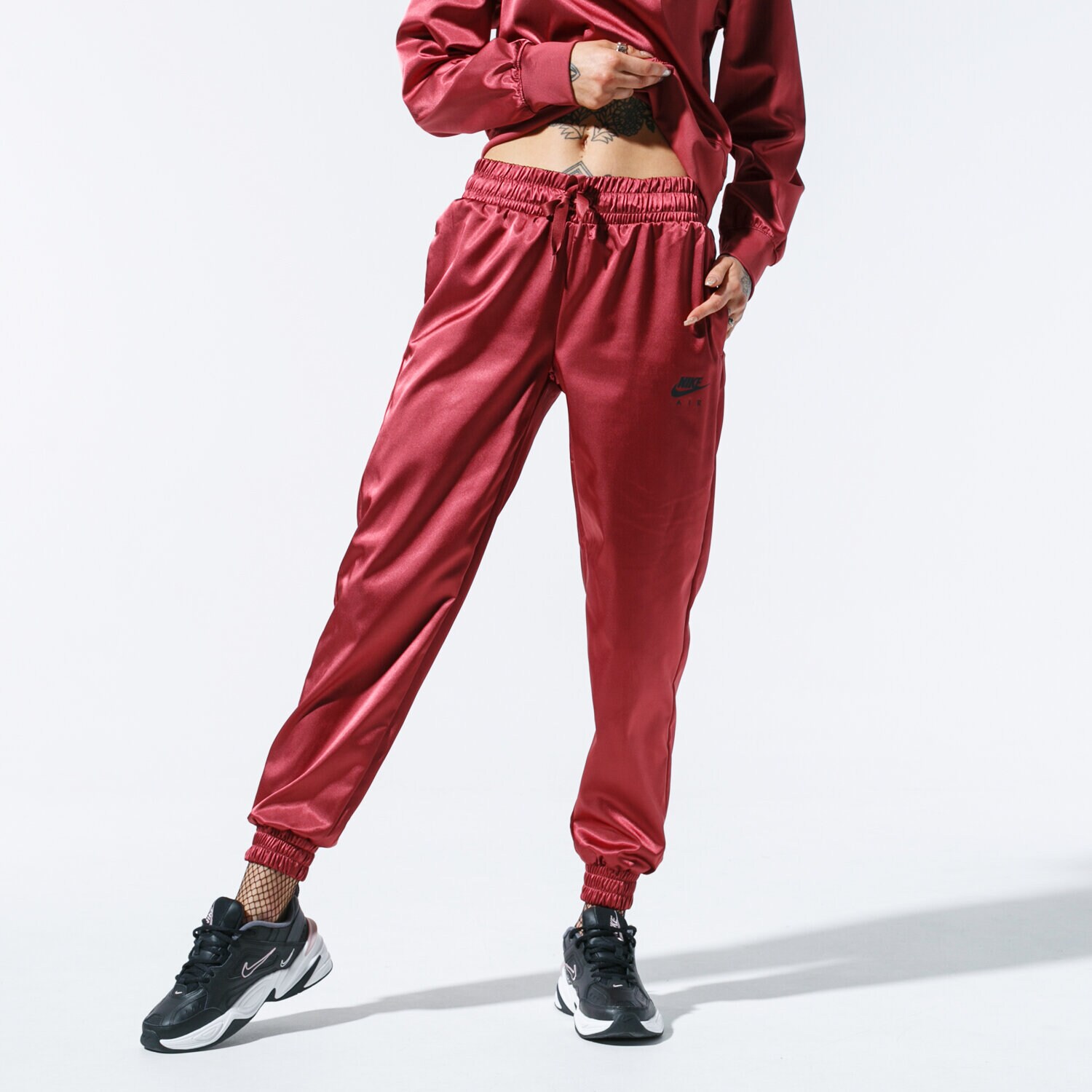 Spodnie sportowe damskie NIKE SPODNIE W NSW AIR TRK PANT SATIN BV4781-661 BORDOWY