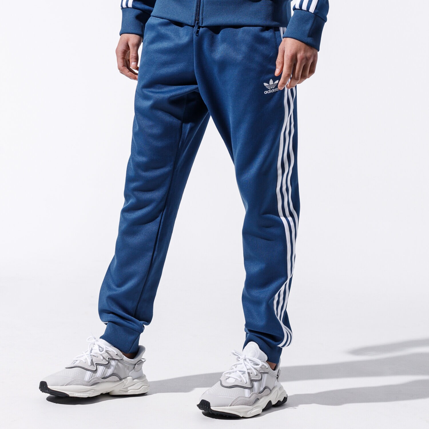 Spodnie sportowe męskie ADIDAS SPODNIE SST TP FM3807 GRANATOWY