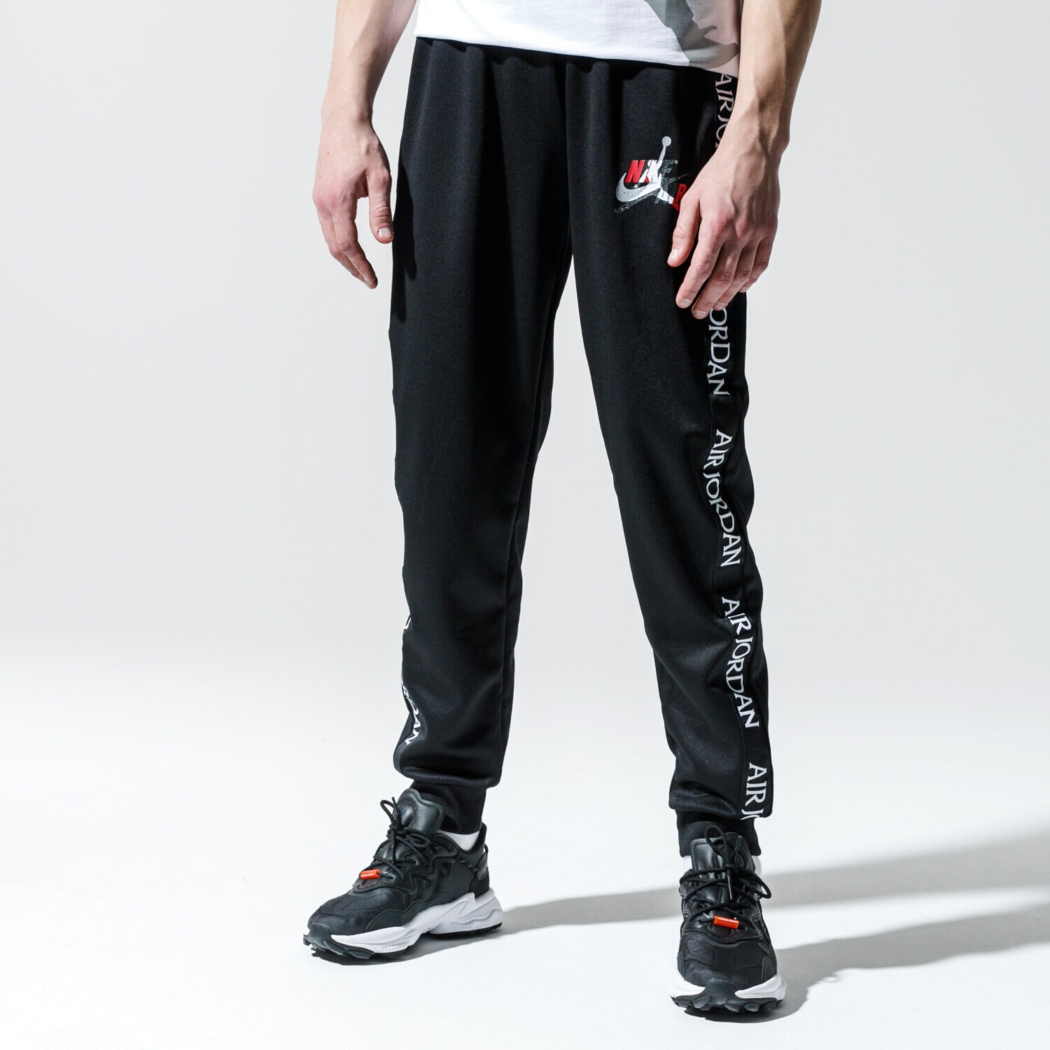 Spodnie sportowe męskie JORDAN SPODNIE M J JM CLSCS TRICOT WRMP PANT CT9373-010 CZARNY