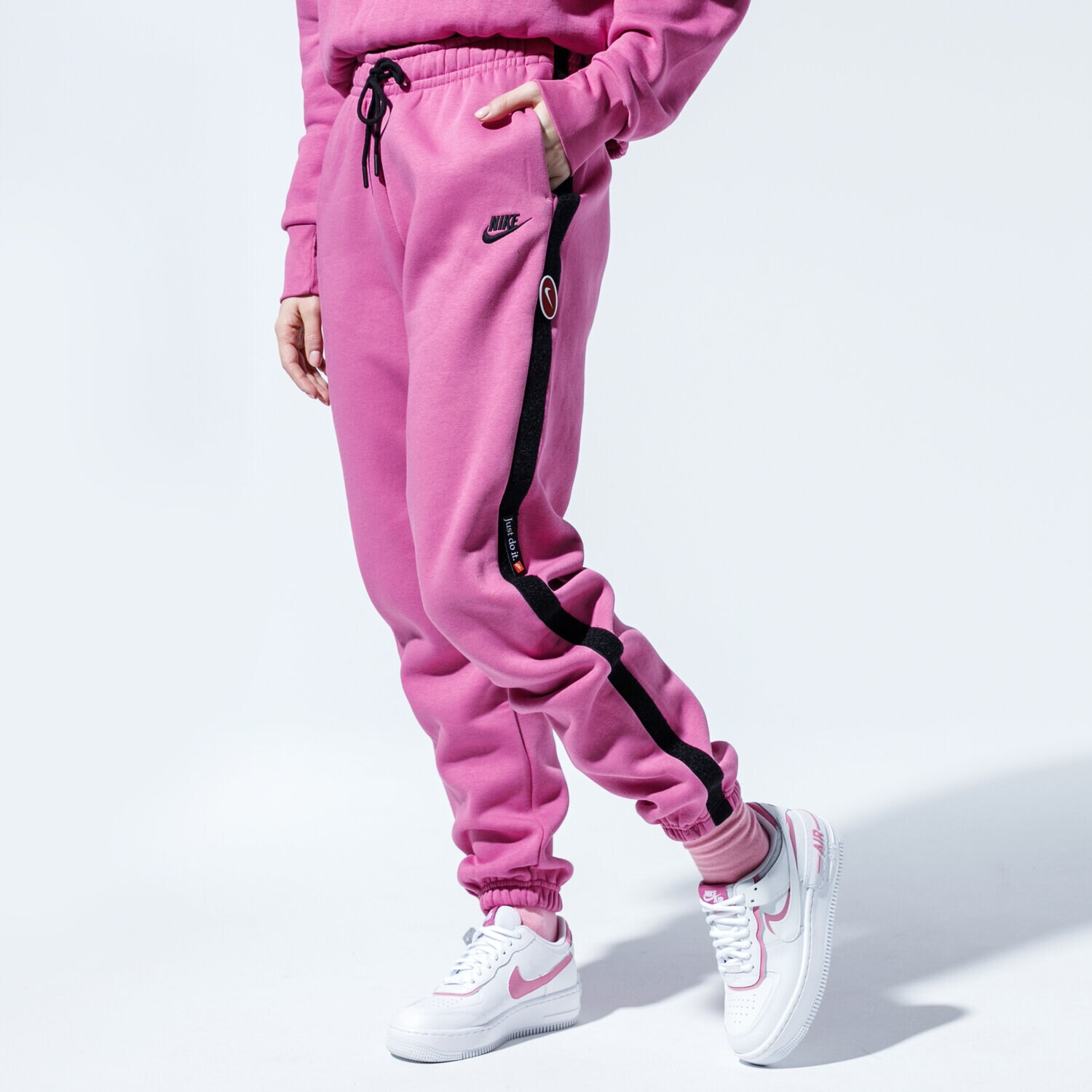 Spodnie sportowe damskie NIKE SPODNIE W NSW ICN CLSH FLC PANT BB CJ2036-691 RÓŻOWY