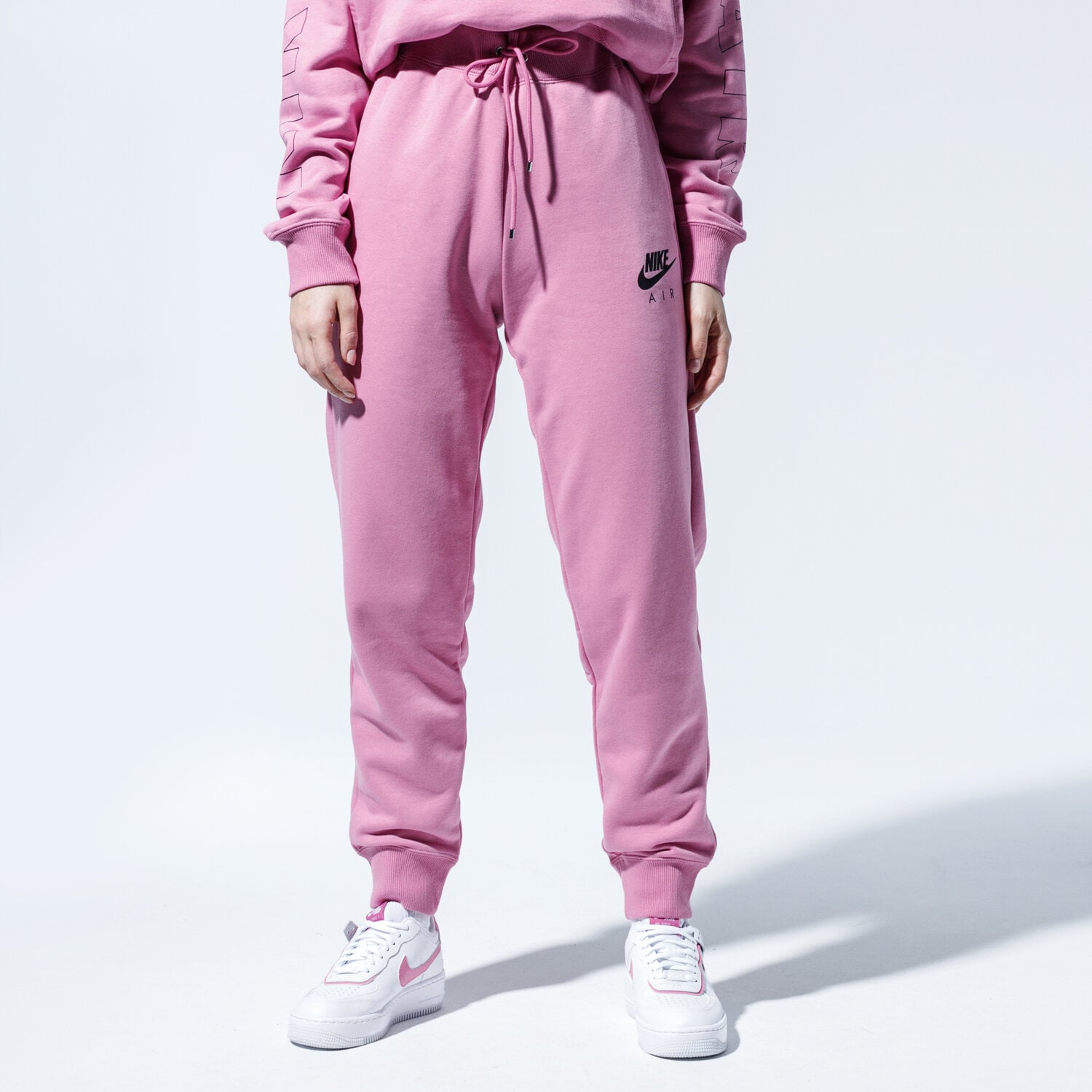 Spodnie sportowe damskie NIKE SPODNIE W NSW AIR PANT FLC BB CJ3047-693 RÓŻOWY