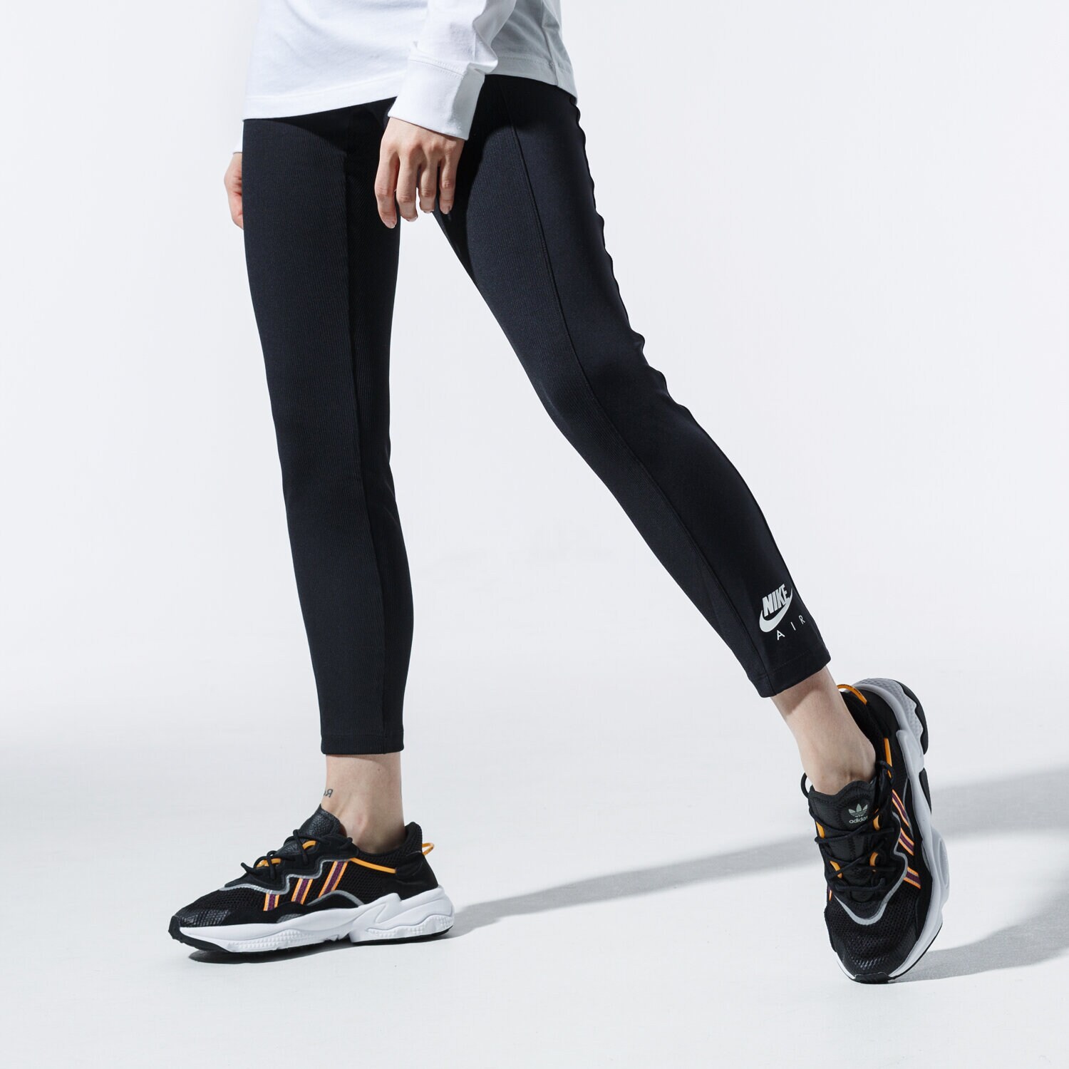 Spodnie sportowe damskie NIKE LEGGINGS AIR CJ3077-010 CZARNY