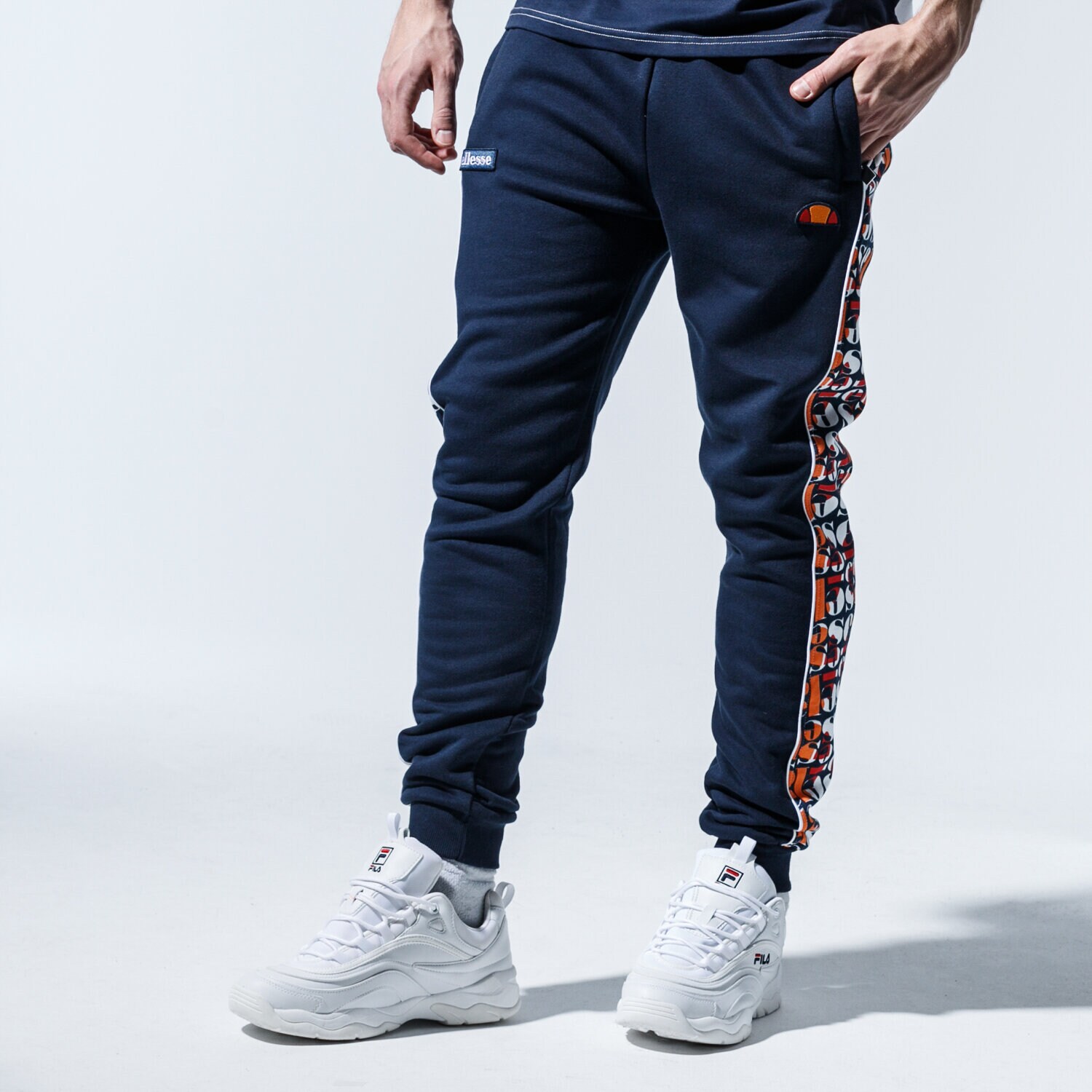 Spodnie sportowe męskie ELLESSE SPODNIE MANORE SHE08863NAVY GRANATOWY