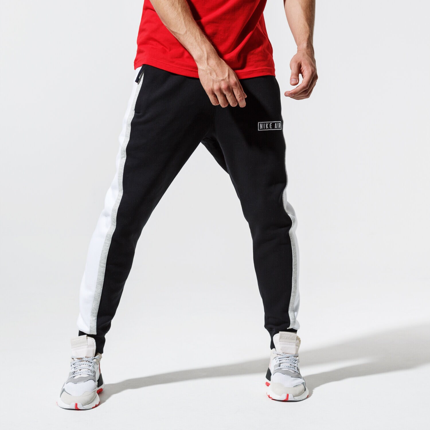 Spodnie sportowe męskie NIKE SPODNIE M NSW NIKE AIR PANT FLC BV5147-010 CZARNY
