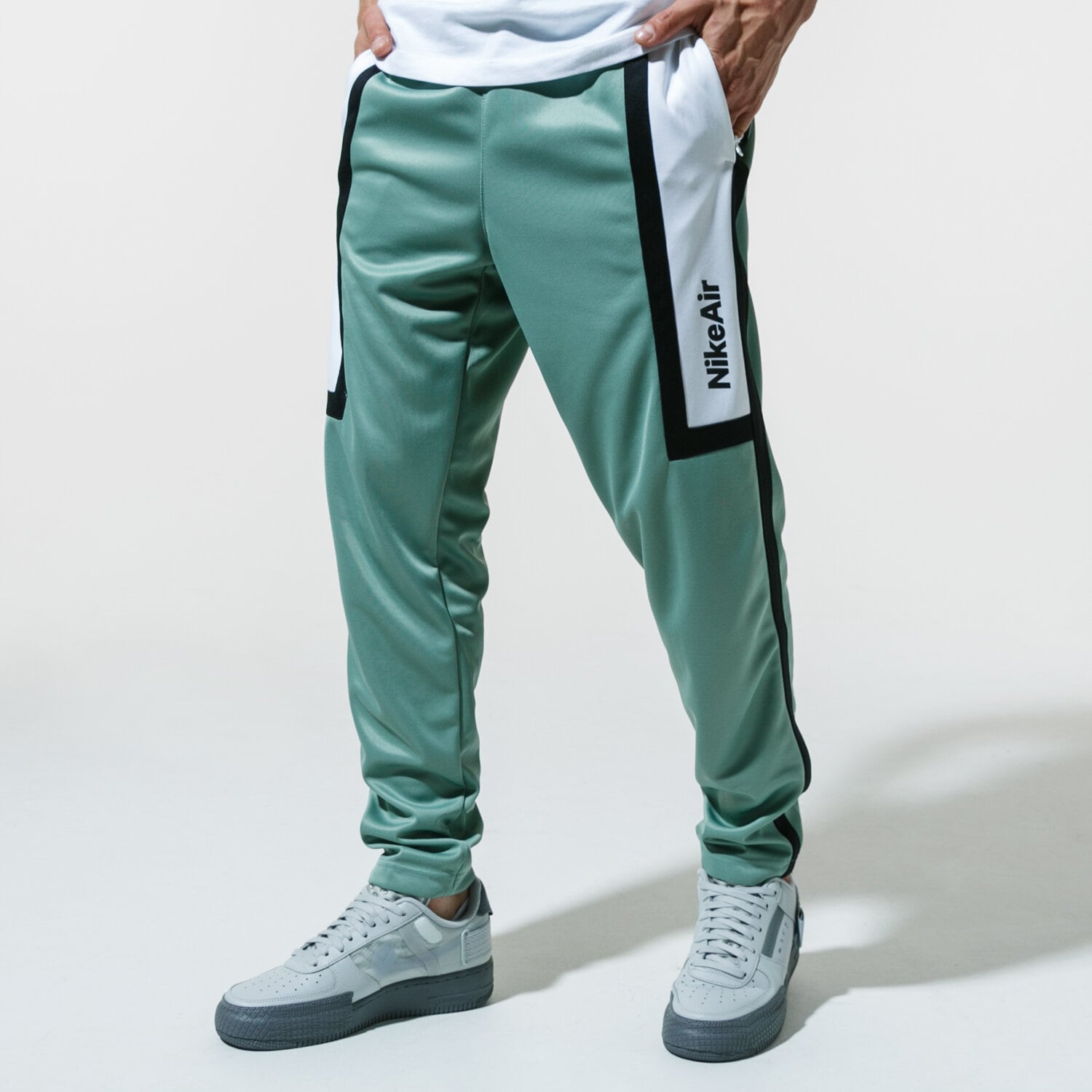Spodnie sportowe męskie NIKE SPODNIE AIR CJ4838-352 ZIELONY