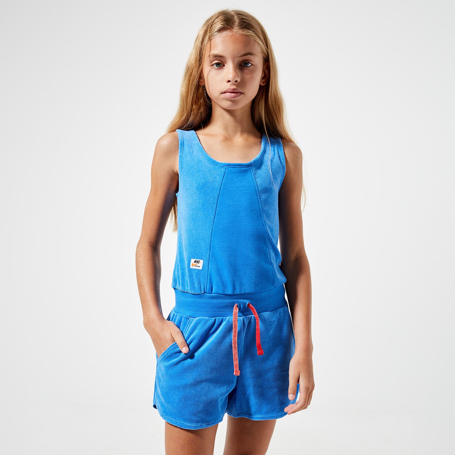 Sportowe spodnie dziecięce NIKE G NSW HERITAGE ROMPER CJ7543-402 NIEBIESKI