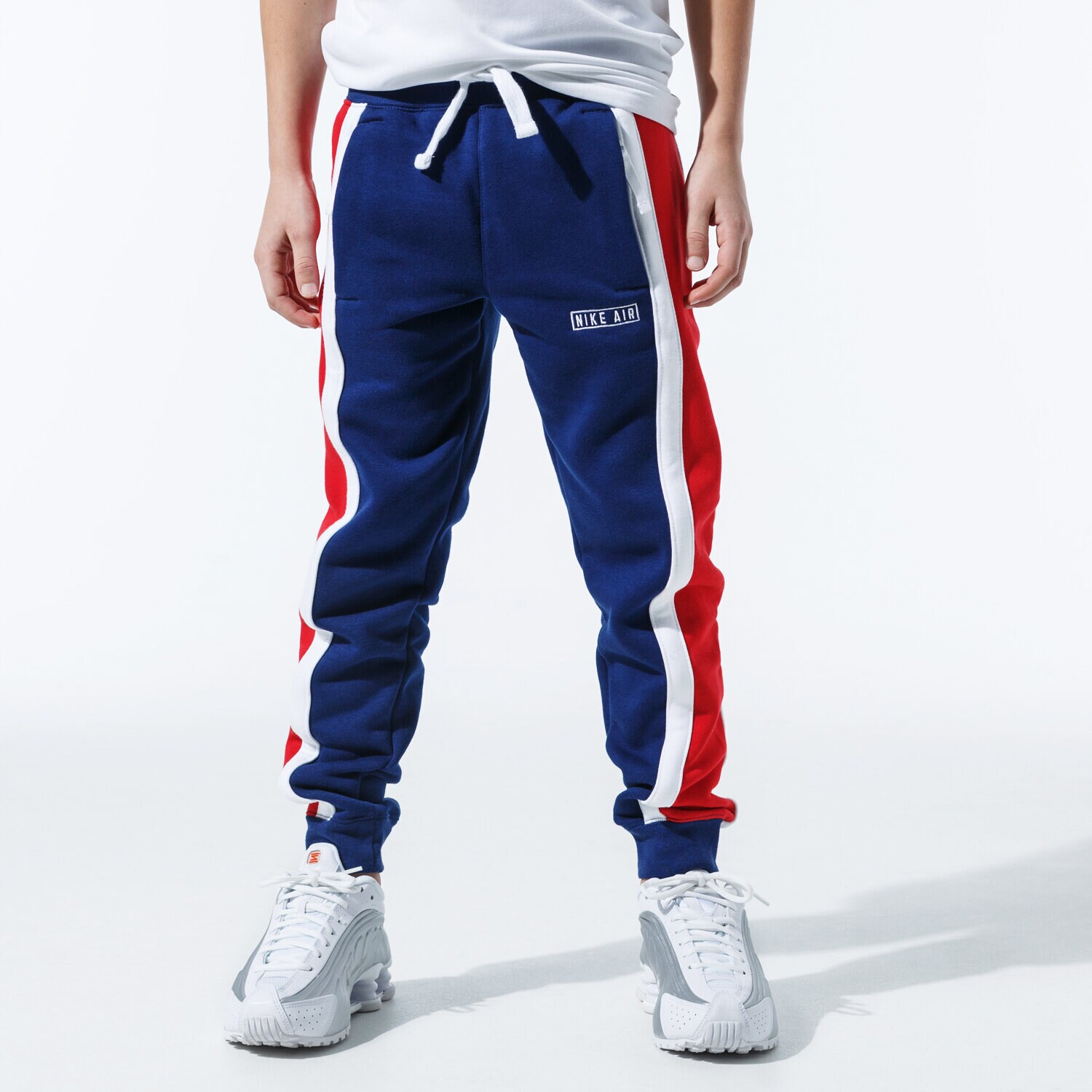 Sportowe spodnie dziecięce NIKE SPODNIE B NIKE AIR PANT BV3598-492 GRANATOWY