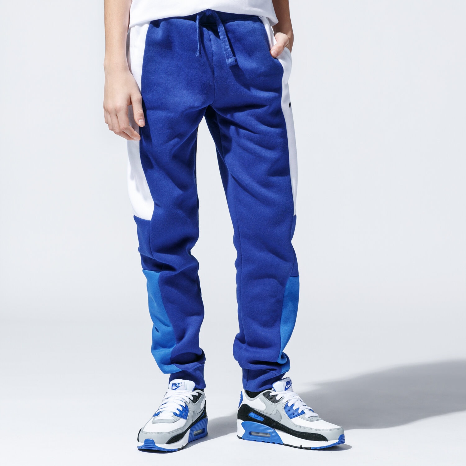 Sportowe spodnie dziecięce NIKE SPODNIE AIR CJ7857-455 NIEBIESKI