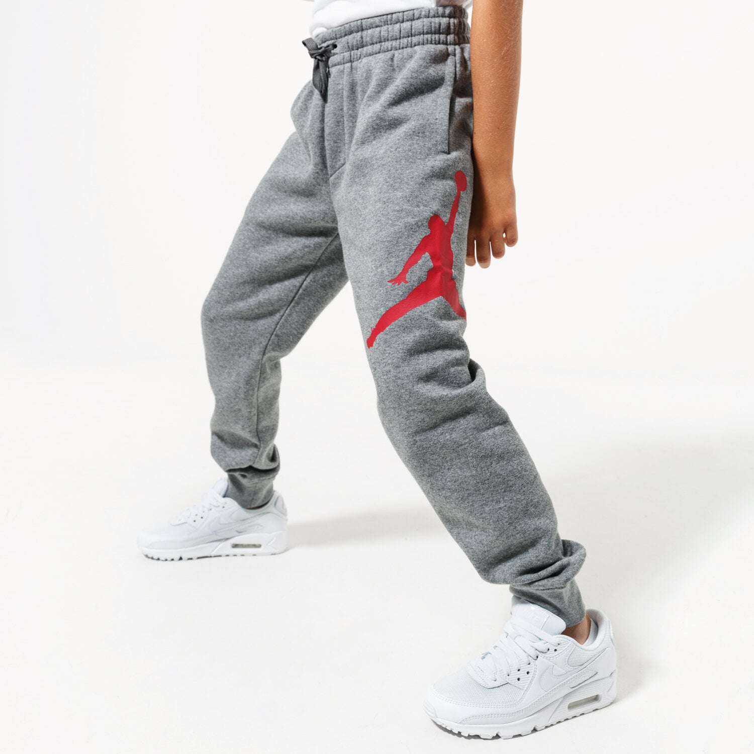 Sportowe spodnie dziecięce JORDAN SPODNIE JDB JUMPMAN LOGO FLEECE PANT BOY 956327-GEH SZARY