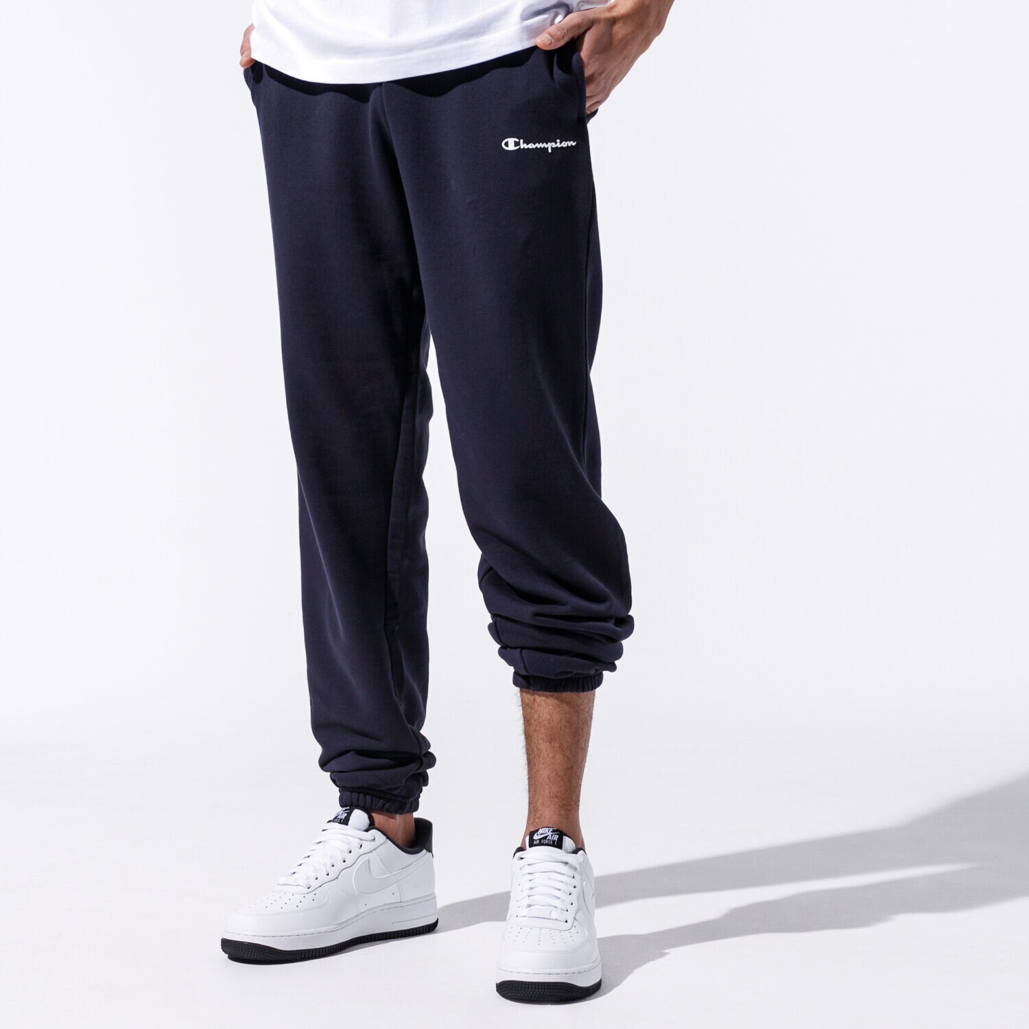 Spodnie sportowe męskie CHAMPION SPODNIE BASIC CUFF PANTS 214538BS501 GRANATOWY