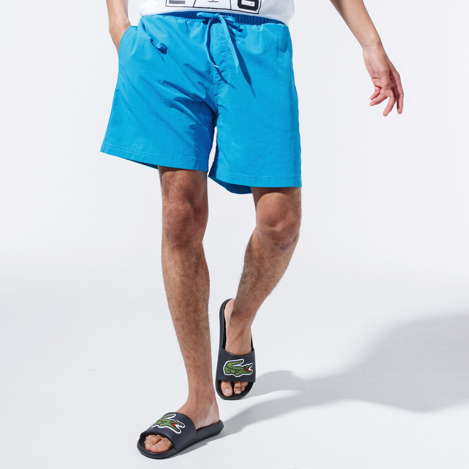 Krótkie spodenki, szorty męskie CHAMPION SZORTY BASIC SWIM SHORTS 215498BS030 NIEBIESKI