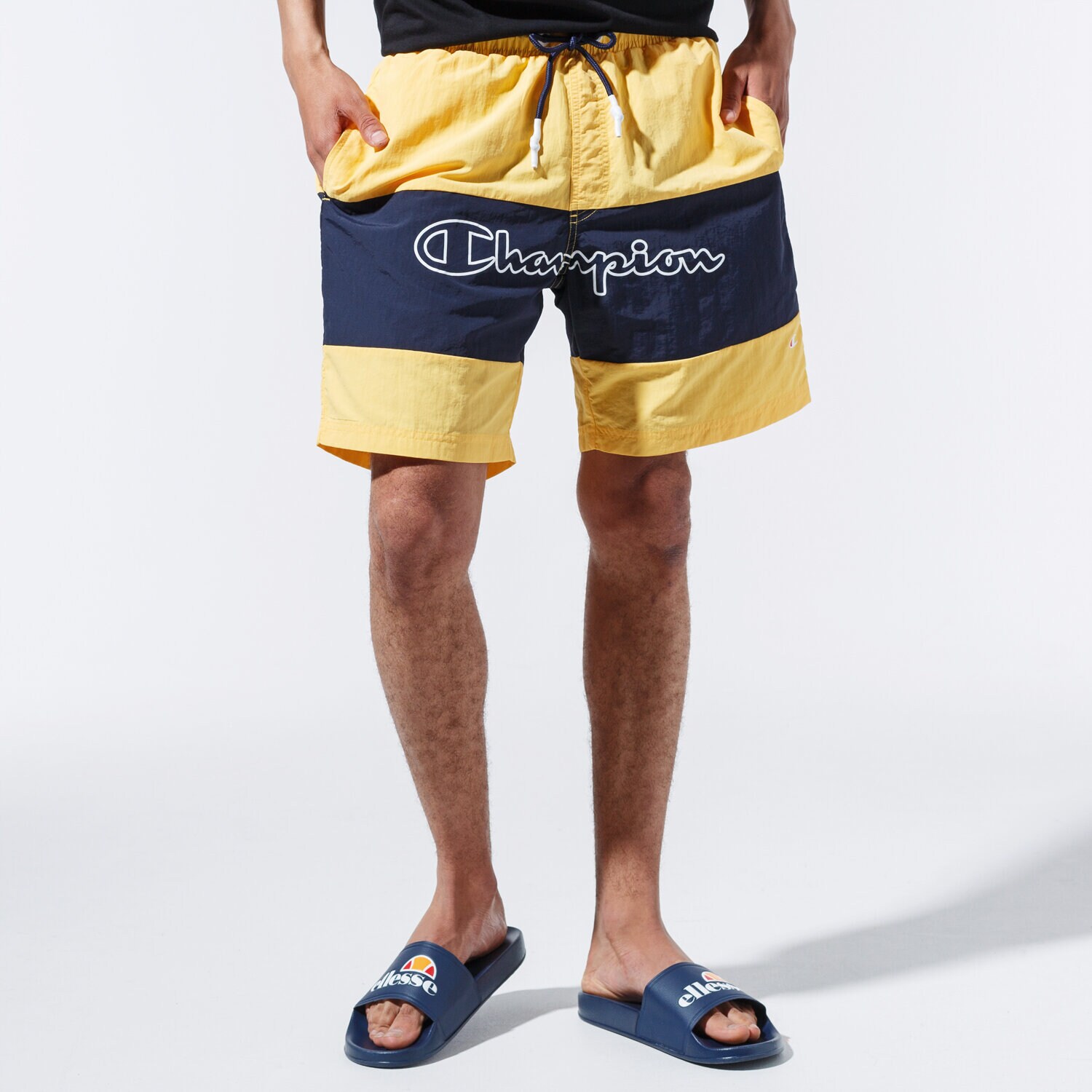 Krótkie spodenki, szorty męskie CHAMPION SZORTY LOGO SWIM SHORTS 215499YS001 ŻÓŁTY